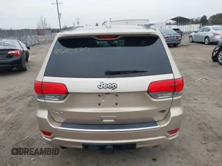 2015 Jeep Grand Cherokee Overland with VIN 1C4RJFCG5FC928085, listed as a IAAI auction lot 41540870 with 93,846 mi miles. Bid and sale history available at carsss.com. Image 16.