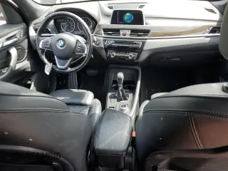 2018 BMW X1 xDrive28i with VIN WBXHT3C36J5F89230, listed as a Copart auction lot 62904545 with 170,860 mi miles and Salvage title. Bid and sale history available at DreamBid. Image 8.