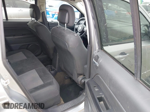 2016 Jeep Compass Sport with VIN 1C4NJDBB8GD780146, listed as a IAAI auction lot 41792416 with 127,548 mi miles. Bid and sale history available at carsss.com. Image 8.