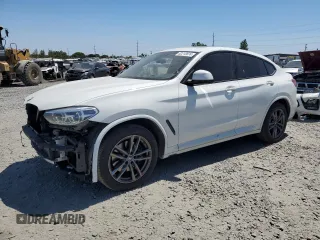 2021 BMW X4 M40i with VIN 5UX2V5C07M9F53847, listed as a Copart auction lot 62213674 with 42,246 mi miles and Salvage Title. Bid and sale history available at carsss.com. Image 1.