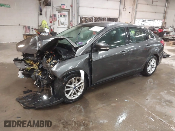 2016 Ford Focus SE with VIN 1FADP3F21GL247906, listed as a IAAI auction lot 42043546 with 124,532 mi miles and . Bid and sale history available at DreamBid. Image 17.