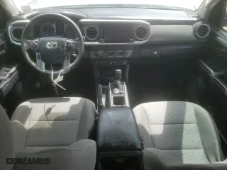 2020 Toyota Tacoma 4WD SR5 with VIN 3TMCZ5AN6LM310312, listed as a Copart auction lot 50162955 with 82,710 mi miles and Salvage Title. Bid and sale history available at carsss.com. Image 8.