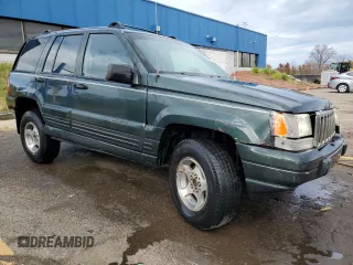 1996 Jeep Grand Cherokee Laredo with VIN 1J4GZ58S4TC281689, listed as a Copart auction lot 78466524 with 0 mi miles and Salvage Title. Bid and sale history available at carsss.com. Image 4.