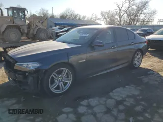 2015 BMW 5 Series 535i with VIN WBA5B1C59FG128862, listed as a Copart auction lot 42801015 with 116,089 mi miles and Salvage title. Bid and sale history available at DreamBid. Image 1.