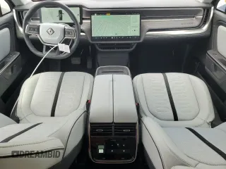 2025 Rivian R1S Adventure z VIN 7PDSGBBA5SN067374, wystawiony jako Copart lot #55279895 z przebiegiem 1 120 mil mil oraz Szkoda całkowita • Salvage title. Historia ofert i sprzedaży dostępna na DreamBid. Obrazek 8.