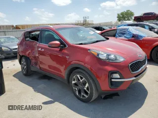 2020 Kia Sportage EX with VIN KNDPNCAC5L7708606, listed as a Copart auction lot 56987605 with 99,018 mi miles and Salvage title. Bid and sale history available at DreamBid. Image 4.