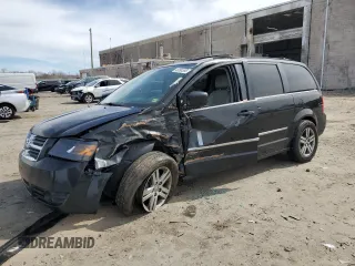 2010 Dodge Grand Caravan SXT with VIN 2D4RN5DX7AR384124, listed as a Copart auction lot 48694595 with 162,020 mi miles and Salvage Title. Bid and sale history available at DreamBid. Image 1.