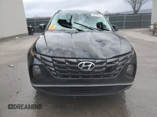 2023 Hyundai Tucson SEL with VIN 5NMJBCAE2PH270674, listed as a Copart auction lot 82879614 with 11,673 mi miles and Salvage Title. Bid and sale history available at DreamBid. Image 5.
