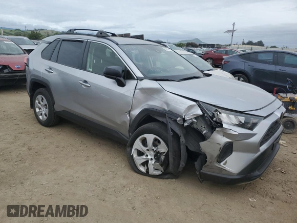 2019 Toyota RAV4 LE with VIN JTMH1RFV7KJ003899, listed as a Copart auction lot 52204315 with 27,491 mi miles and Salvage Title. Bid and sale history available at carsss.com. Image 4.