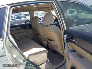 2007 Honda CR-V EX with VIN JHLRE38547C055685, listed as a IAAI auction lot 41897899 with 221,445 mi miles. Bid and sale history available at carsss.com. Image 8.