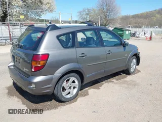 2005 Pontiac Vibe with VIN 5Y2SL63865Z427576, listed as a IAAI auction lot 42051342 with 159,708 mi miles. Bid and sale history available at carsss.com. Image 4.