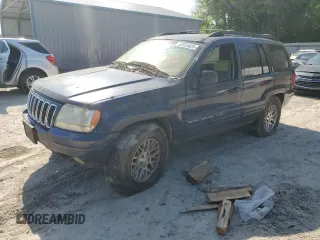 2003 Jeep Grand Cherokee Limited z VIN 1J8GW58N63C592607, wystawiony jako Copart lot #52824825 z przebiegiem Nie podano mil oraz Czysty tytuł • Clean title. Historia ofert i sprzedaży dostępna na DreamBid. Obrazek 1.