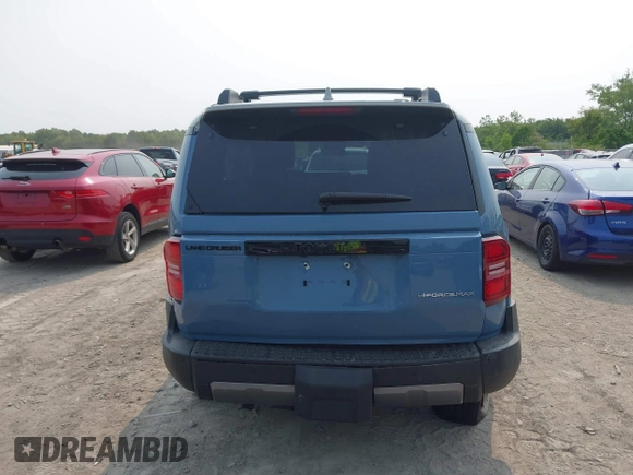 2024 Toyota Land Cruiser z VIN JTEABFAJ3RK018014, wystawiony jako IAAI lot #42404632 z przebiegiem 2 983 mil mil oraz . Historia ofert i sprzedaży dostępna na DreamBid. Obrazek 16.