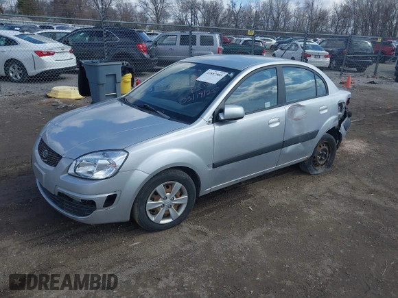 2009 Kia Rio LX with VIN KNADE223796521410, listed as a IAAI auction lot 41887883 with 82,360 mi miles and . Bid and sale history available at DreamBid. Image 2.