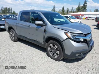 2019 Honda Ridgeline RTL z VIN 5FPYK3F54KB018272, wystawiony jako IAAI lot #42184895 z przebiegiem 75 362 mil mil oraz . Historia ofert i sprzedaży dostępna na DreamBid. Obrazek 1.