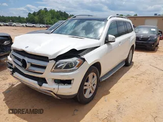 2014 Mercedes-Benz GL 450 z VIN 4JGDF7CE2EA287810, wystawiony jako IAAI lot #39696896 z przebiegiem 181 816 mil mil oraz . Historia ofert i sprzedaży dostępna na DreamBid. Obrazek 18.