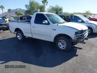 1997 Ford F-150 z VIN 1FTDF1727VKA49639, wystawiony jako IAAI lot #42121938 z przebiegiem 317 520 mil mil oraz . Historia ofert i sprzedaży dostępna na DreamBid. Obrazek 1.