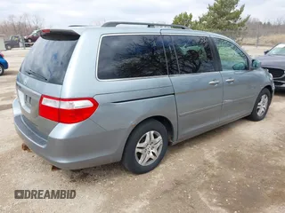 2007 Honda Odyssey EX-L with VIN 5FNRL38717B018097, listed as a IAAI auction lot 42028592 with 141,004 mi miles and . Bid and sale history available at DreamBid. Image 4.
