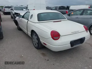 2002 Ford Thunderbird w/Hardtop Premium with VIN 1FAHP60A62Y127579, listed as a IAAI auction lot 42035019 with 98,582 mi miles. Bid and sale history available at carsss.com. Image 3.