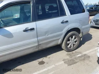 2003 Honda Pilot EX with VIN 2HKYF18443H571688, listed as a IAAI auction lot 42097297 with 313,910 mi miles. Bid and sale history available at carsss.com. Image 15.