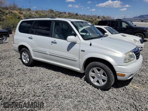 2003 Suzuki XL7 Touring with VIN JS3TX92V034109417, listed as a Copart auction lot 52672475 with 96,760 mi miles and Salvage title. Bid and sale history available at DreamBid. Image 4.