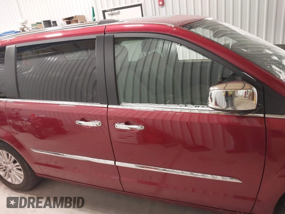 2015 Chrysler Town & Country Limited Platinum with VIN 2C4RC1GGXFR597180, listed as a IAAI auction lot 41374817 with 90,088 mi miles and . Bid and sale history available at DreamBid. Image 13.
