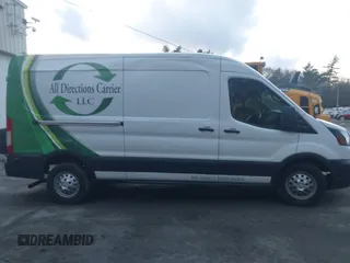 2020 Ford Transit Cargo z VIN 1FTBR2C87LKA34635, wystawiony jako IAAI lot #41201981 z przebiegiem 89 814 mil mil oraz . Historia ofert i sprzedaży dostępna na DreamBid. Obrazek 13.