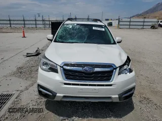 2018 Subaru Forester Touring with VIN JF2SJAWC4JH435749, listed as a Copart auction lot 63526465 with 143,029 mi miles and Salvage title. Bid and sale history available at DreamBid. Image 5.