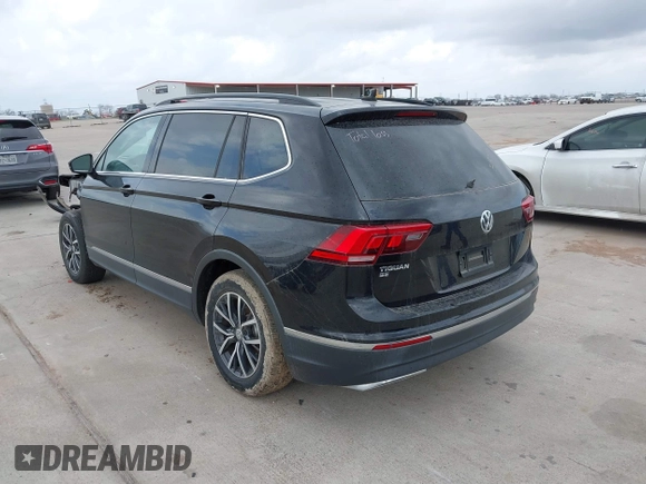 2020 Volkswagen Tiguan SE with VIN 3VV3B7AX7LM067046, listed as a IAAI auction lot 41697405 with 53,573 mi miles and . Bid and sale history available at DreamBid. Image 3.