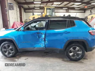 2019 Jeep Compass Latitude with VIN 3C4NJDBB8KT748817, listed as a IAAI auction lot 41289661 with 115,031 mi miles. Bid and sale history available at carsss.com. Image 14.