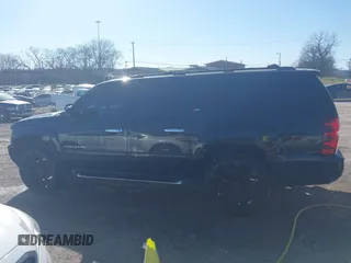 2011 Chevrolet Suburban LT with VIN 1GNSCJE06BR293634, listed as a IAAI auction lot 41742616 with 204,222 mi miles. Bid and sale history available at carsss.com. Image 14.