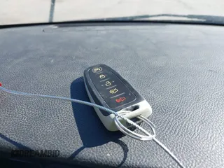 2013 Ford Taurus SHO с VIN 1FAHP2KT0DG220825, выставлен на аукционе IAAI как лот 41851095 с пробегом 163 797 миль миль и . История ставок и продаж доступна на DreamBid. Изображение 11.