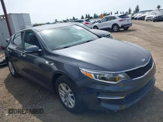 2018 Kia Optima LX z VIN KNAGT4L36J5216858, wystawiony jako IAAI lot #42149047 z przebiegiem 121 845 mil mil oraz . Historia ofert i sprzedaży dostępna na DreamBid. Obrazek 14.