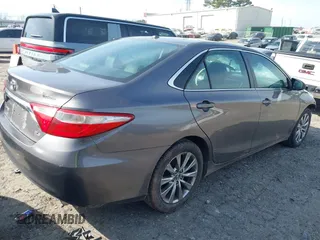 2015 Toyota Camry XLE with VIN 4T1BF1FK2FU014159, listed as a IAAI auction lot 41678454 with 126,113 mi miles and . Bid and sale history available at DreamBid. Image 4.