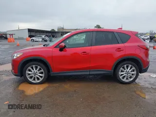2015 Mazda CX-5 Grand Touring with VIN JM3KE4DY6F0501072, listed as a IAAI auction lot 41534176 with 90,160 mi miles. Bid and sale history available at carsss.com. Image 14.