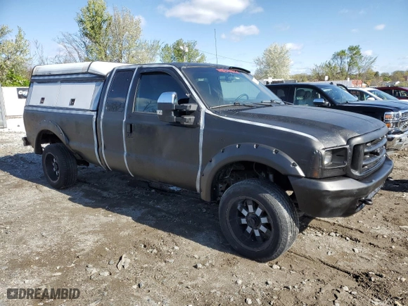 1999 Ford Super Duty F-250 XL with VIN 1FTNX21L5XEA67499, listed as a Copart auction lot 50822095 with 480,067 mi miles and Salvage Title. Bid and sale history available at carsss.com. Image 4.