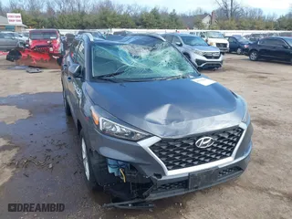 2019 Hyundai Tucson Value with VIN KM8J33A40KU999340, listed as a IAAI auction lot 41876380 with 52,752 mi miles. Bid and sale history available at carsss.com. Image 6.