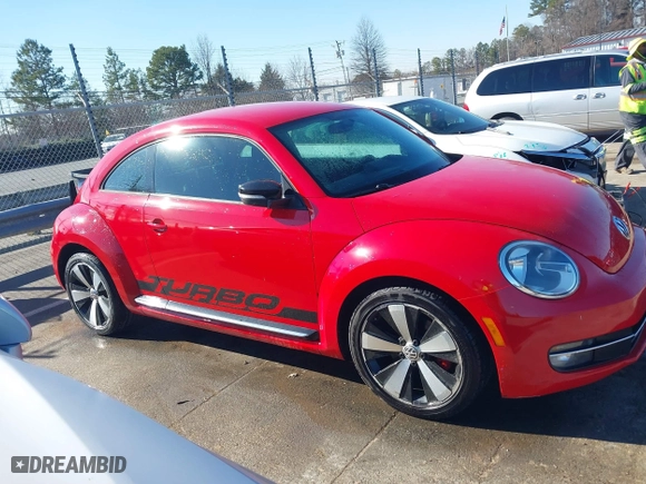 2012 Volkswagen Beetle 2.0T Turbo w/Sun/Sound with VIN 3VWV67ATXCM650376, listed as a IAAI auction lot 41315431 with 104,523 mi miles. Bid and sale history available at carsss.com. Image 13.