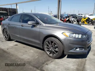 2013 Ford Fusion SE Hybrid z VIN 3FA6P0LUXDR362711, wystawiony jako Copart lot #57060425 z przebiegiem 155 031 mil mil oraz Szkoda całkowita • Salvage title. Historia ofert i sprzedaży dostępna na DreamBid. Obrazek 4.