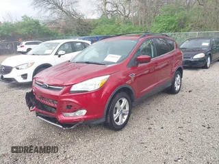 2013 Ford Escape SE with VIN 1FMCU0GXXDUB14120, listed as a IAAI auction lot 42060145 with 171,758 mi miles. Bid and sale history available at carsss.com. Image 2.