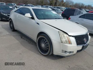 2011 Cadillac CTS Performance with VIN 1G6DJ1ED3B0142767, listed as a IAAI auction lot 41676404 with 238,027 mi miles and . Bid and sale history available at DreamBid. Image 1.