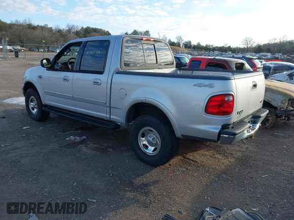 2002 Ford F-150 XLT with VIN 1FTRW08632KE22611, listed as a IAAI auction lot 41519768 with 200,420 mi miles. Bid and sale history available at carsss.com. Image 3.