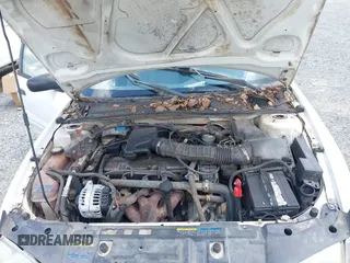 2002 Chevrolet Cavalier with VIN 1G1JC524227214399, listed as a IAAI auction lot 42623707 with Not provided miles and . Bid and sale history available at DreamBid. Image 10.