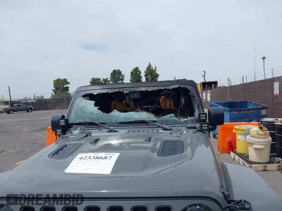 2020 Jeep Wrangler Unlimited Rubicon с VIN 1C4JJXFM4LW100382, выставлен на аукционе IAAI как лот 42338687 с пробегом Не указан миль и . История ставок и продаж доступна на DreamBid. Изображение 6.