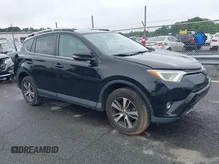 2018 Toyota RAV4 XLE with VIN 2T3WFREVXJW501296, listed as a IAAI auction lot 42358130 with 163,669 mi miles and . Bid and sale history available at DreamBid. Image 1.