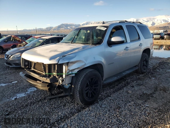 2012 Chevrolet Tahoe LS with VIN 1GNSCAE05CR202824, listed as a Copart auction lot 41580175 with 200,955 mi miles and Salvage title. Bid and sale history available at DreamBid. Image 1.