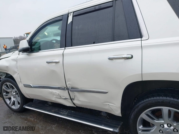 2015 Cadillac Escalade Premium with VIN 1GYS4NKJ9FR547587, listed as a IAAI auction lot 41556378 with 155,038 mi miles. Bid and sale history available at carsss.com. Image 14.
