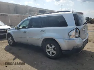 2007 Mercedes-Benz GL-Class with VIN 4JGBF71E77A141285, listed as a Copart auction lot 69225694 with 128,827 mi miles and Salvage Title. Bid and sale history available at carsss.com. Image 2.