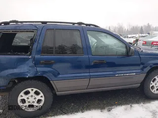 2001 Jeep Grand Cherokee Laredo with VIN 1J4GW48N21C730703, listed as a IAAI auction lot 41581667 with 111,054 mi miles and . Bid and sale history available at DreamBid. Image 14.