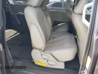 2014 Toyota Sienna XLE with VIN 5TDYK3DC0ES513076, listed as a IAAI auction lot 42724629 with 154,019 mi miles and . Bid and sale history available at DreamBid. Image 8.